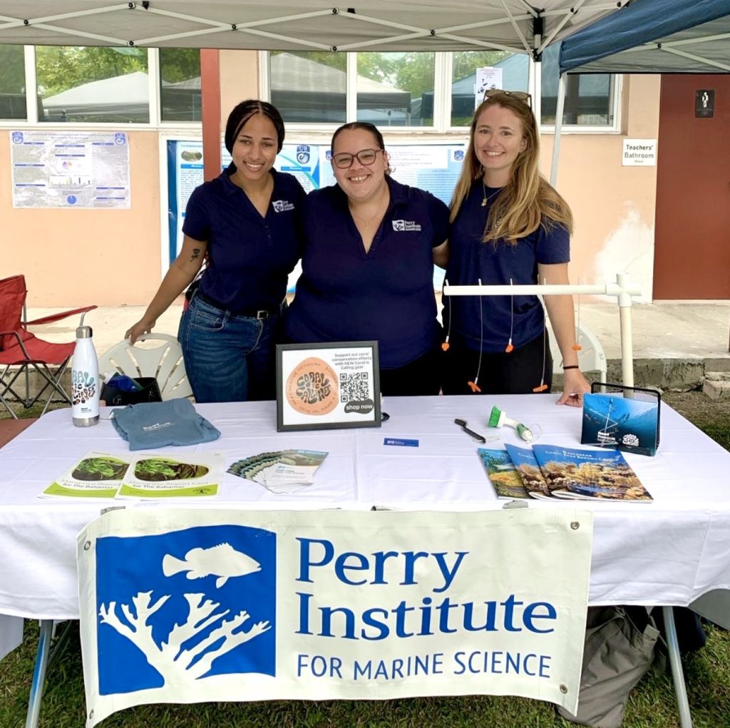 Knowledge is Power: Staff from the Perry Institute for Marine Science (PIMS) engage visitors at their booth, raising awareness about Stony Coral Tissue Loss Disease (SCTLD) and its devastating impact on coral reefs. Through education, we empower communities to take action and join the fight to protect our ocean.